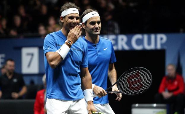 Nadal y Federer, durante el partido ante Querrey y Sock. /Milan Kammermayer (Efe)