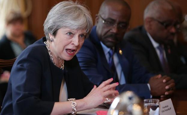 Theresa May con los líderes de los países caribeños./Afp