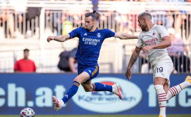 Bale y Theo Hernández/Johann GRODER (AFP)