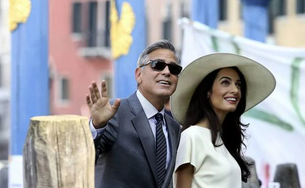 George Clooney y su mujer, en el Festival de Venecia de 2014./Reuters